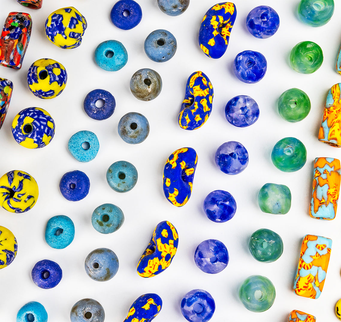 The bag charms are made using recycled glass beads from Ghana, also known as sand cast beads, and other interesting beads and crystals from around the world.